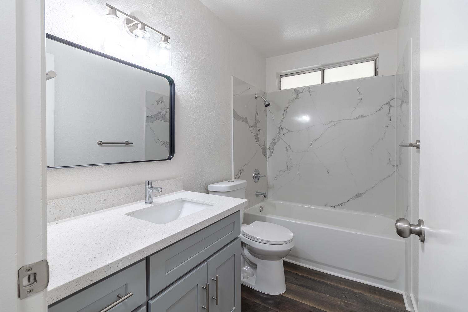 1128 Diablo Avenue Modesto, CA 95358 - Photo 15 of 23 a bathroom with a sink a toilet and shower