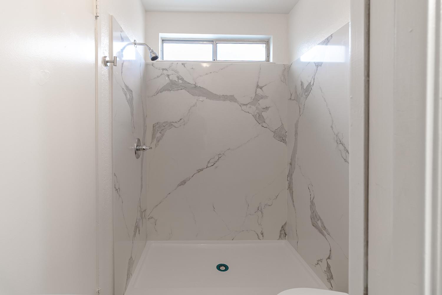 1128 Diablo Avenue Modesto, CA 95358 - Photo 19 of 23 a bathroom with a bathtub