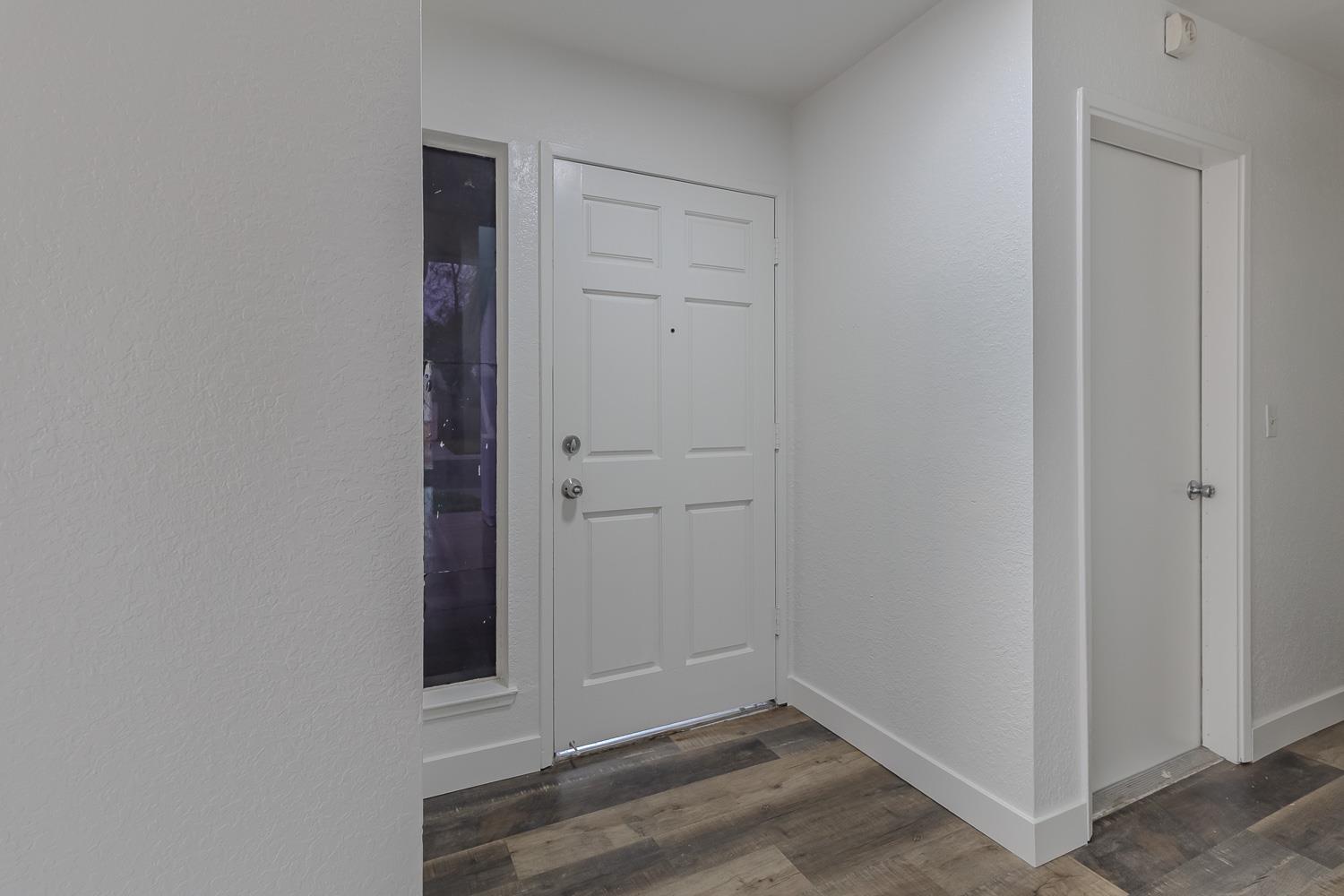 1128 Diablo Avenue Modesto, CA 95358 - Photo 5 of 23 wooden floor in an empty room