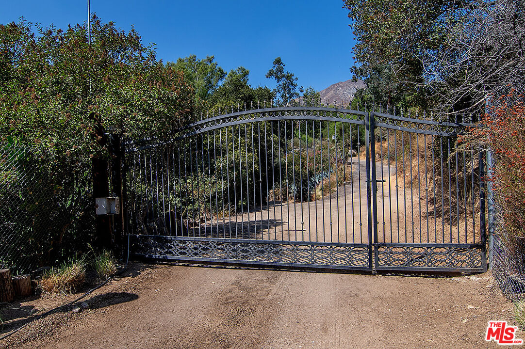 14831 Little Tujunga Canyon Road Sylmar, CA 91342 - Photo 3 of 49 a view of a backyard with a garden
