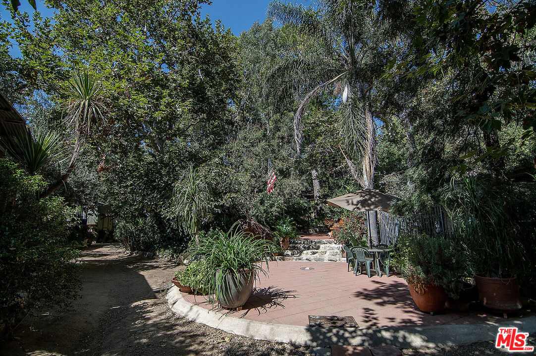 14831 Little Tujunga Canyon Road Sylmar, CA 91342 - Photo 5 of 49 a view of backyard of house with outdoor seating