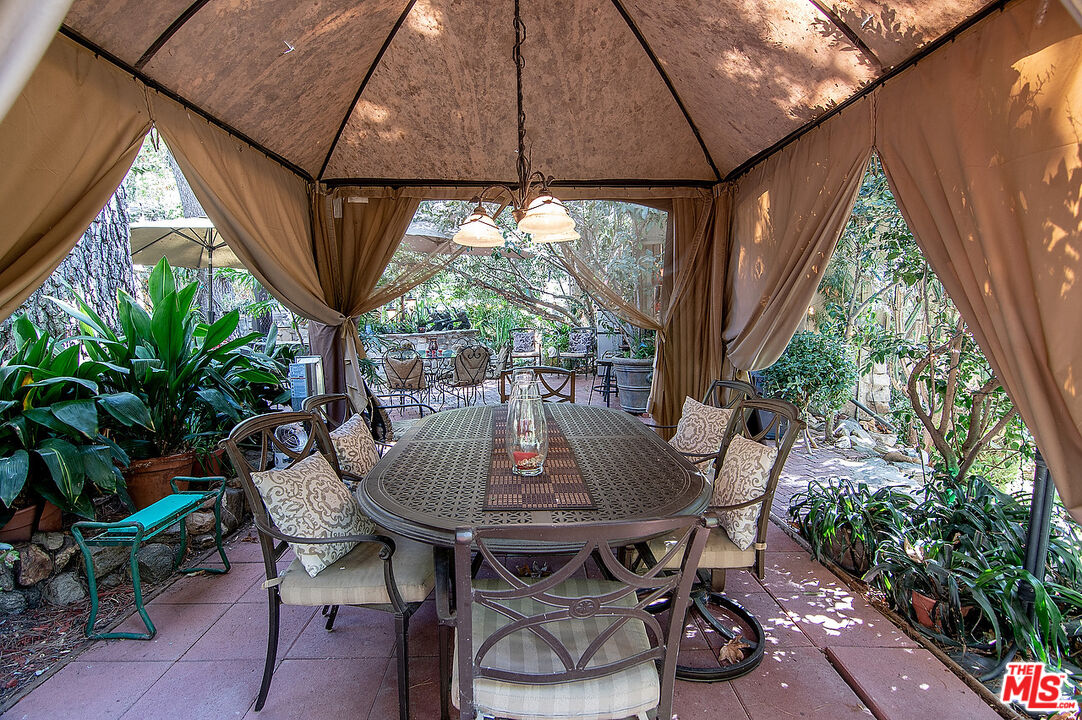 14831 Little Tujunga Canyon Road Sylmar, CA 91342 - Photo 10 of 49 a outdoor dining space with furniture and outdoor view
