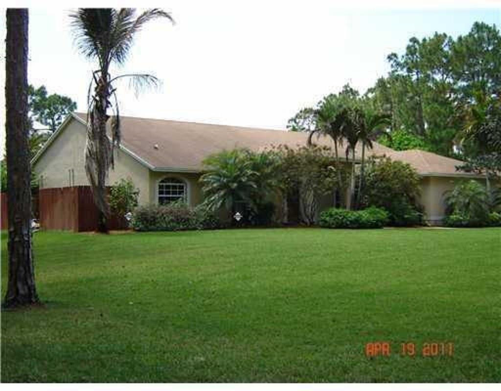 18604 Northwest 43rd Road Loxahatchee, FL 33470 - Photo 1 of 14 EXTERIOR FRONT