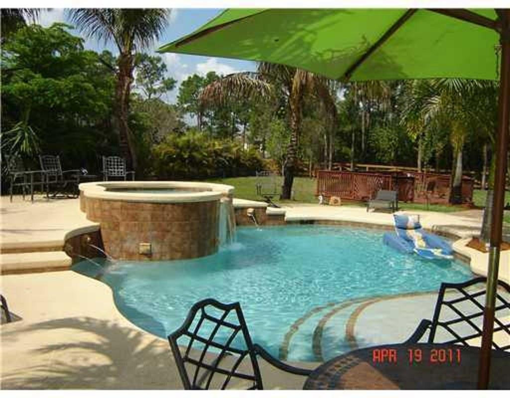 18604 Northwest 43rd Road Loxahatchee, FL 33470 - Photo 5 of 14 POOLAND HOT TUB