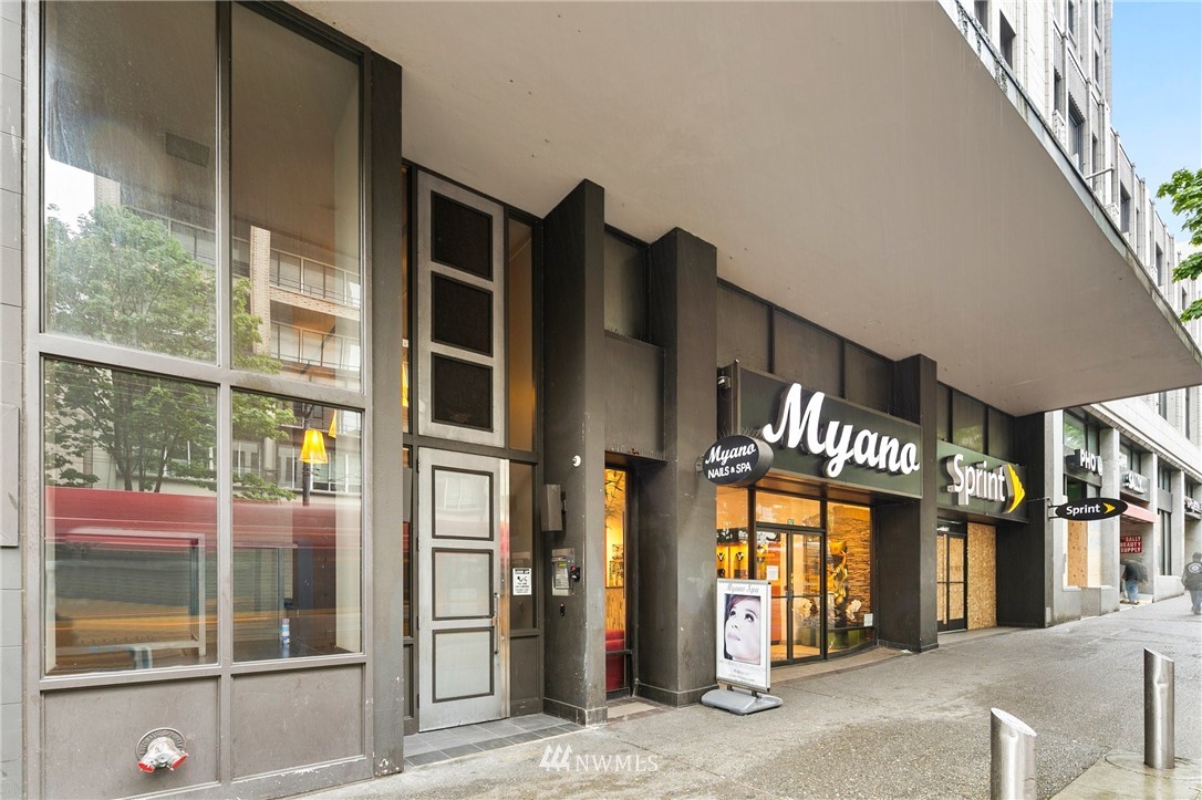 1519 3rd Avenue, Unit 302 Seattle, WA 98101 - Photo 3 of 26 a view of a building with a outdoor space