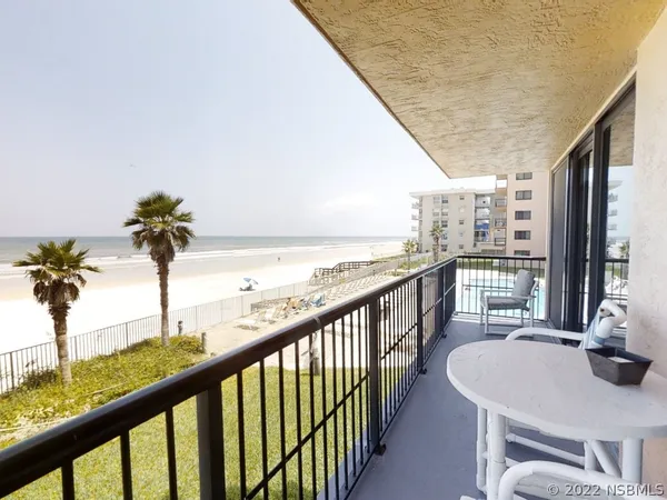 a view of a balcony with lake view and a ocean view