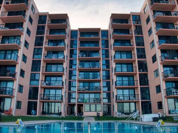 a view of a terrace with a lake view