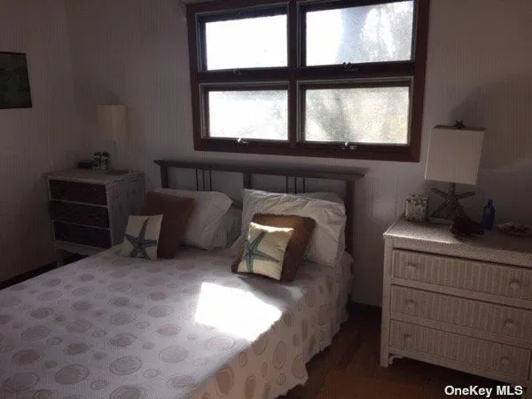 a room with furniture and a window
