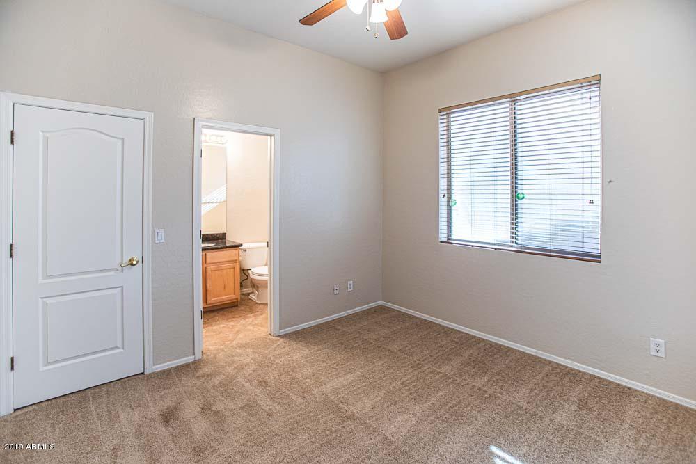 484 East Ranch Road Gilbert, AZ 85296 - Photo 20 of 36 an empty room with windows and closet