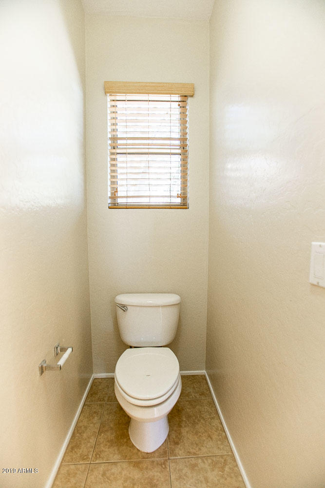 484 East Ranch Road Gilbert, AZ 85296 - Photo 30 of 36 a bathroom with a toilet