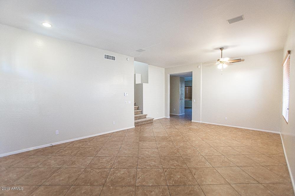 484 East Ranch Road Gilbert, AZ 85296 - Photo 7 of 36 a view of an empty room with a window