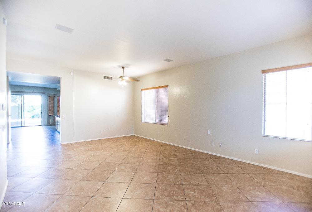 484 East Ranch Road Gilbert, AZ 85296 - Photo 8 of 36 a view of an empty room with a window
