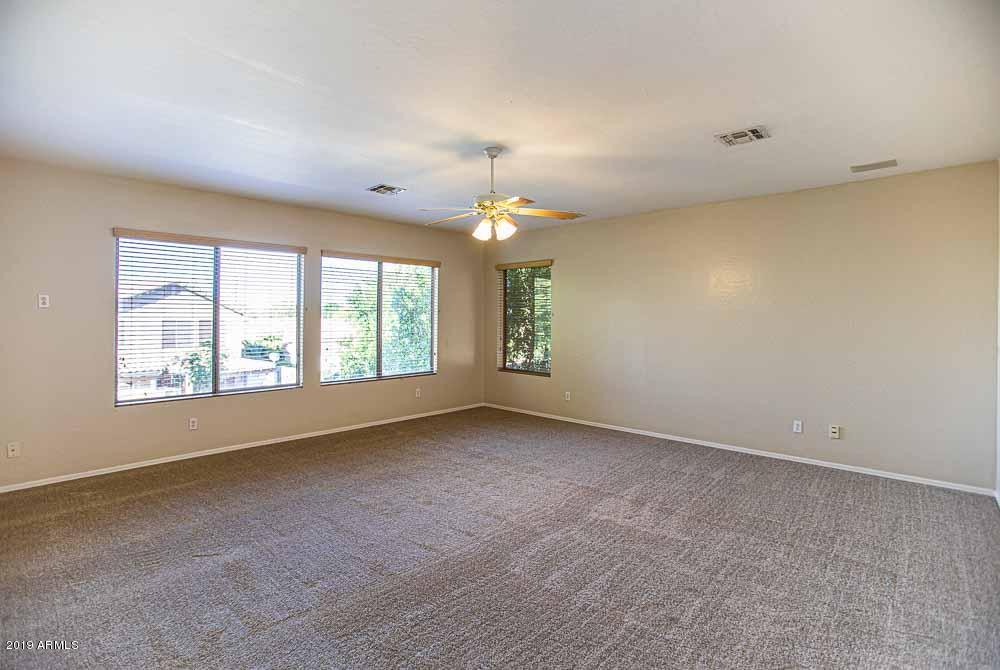 484 East Ranch Road Gilbert, AZ 85296 - Photo 9 of 36 a view of an empty room with a window