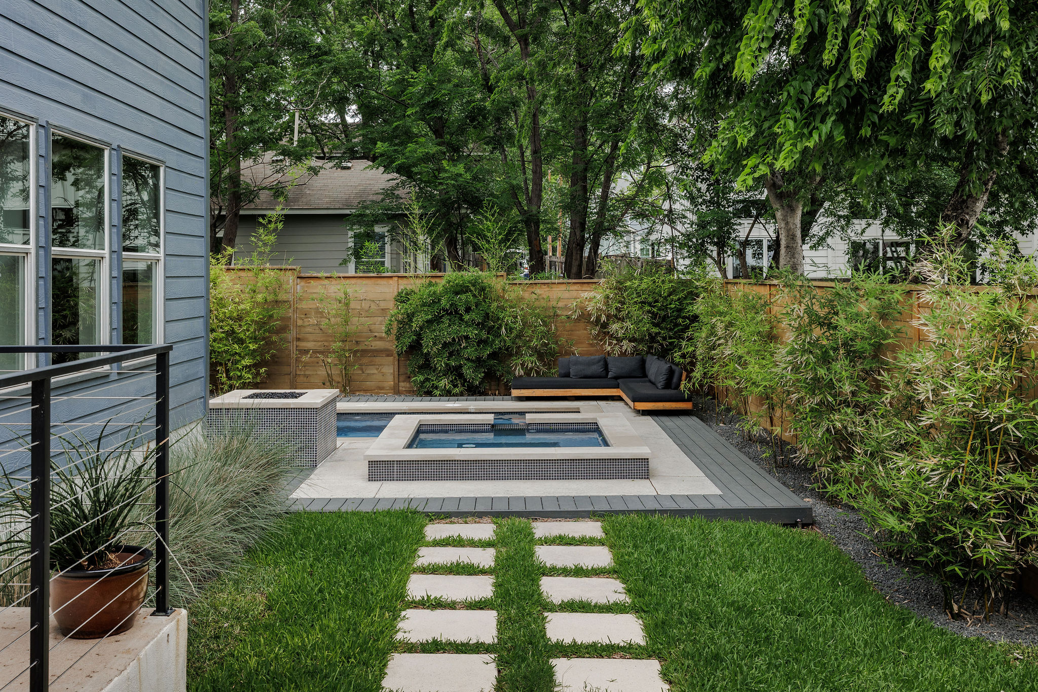 1605 Maple Avenue Austin, TX 78702 - Photo 28 of 33 Backyard oasis featuring a rectangular pool, integrated spa, and a built-in fire pit