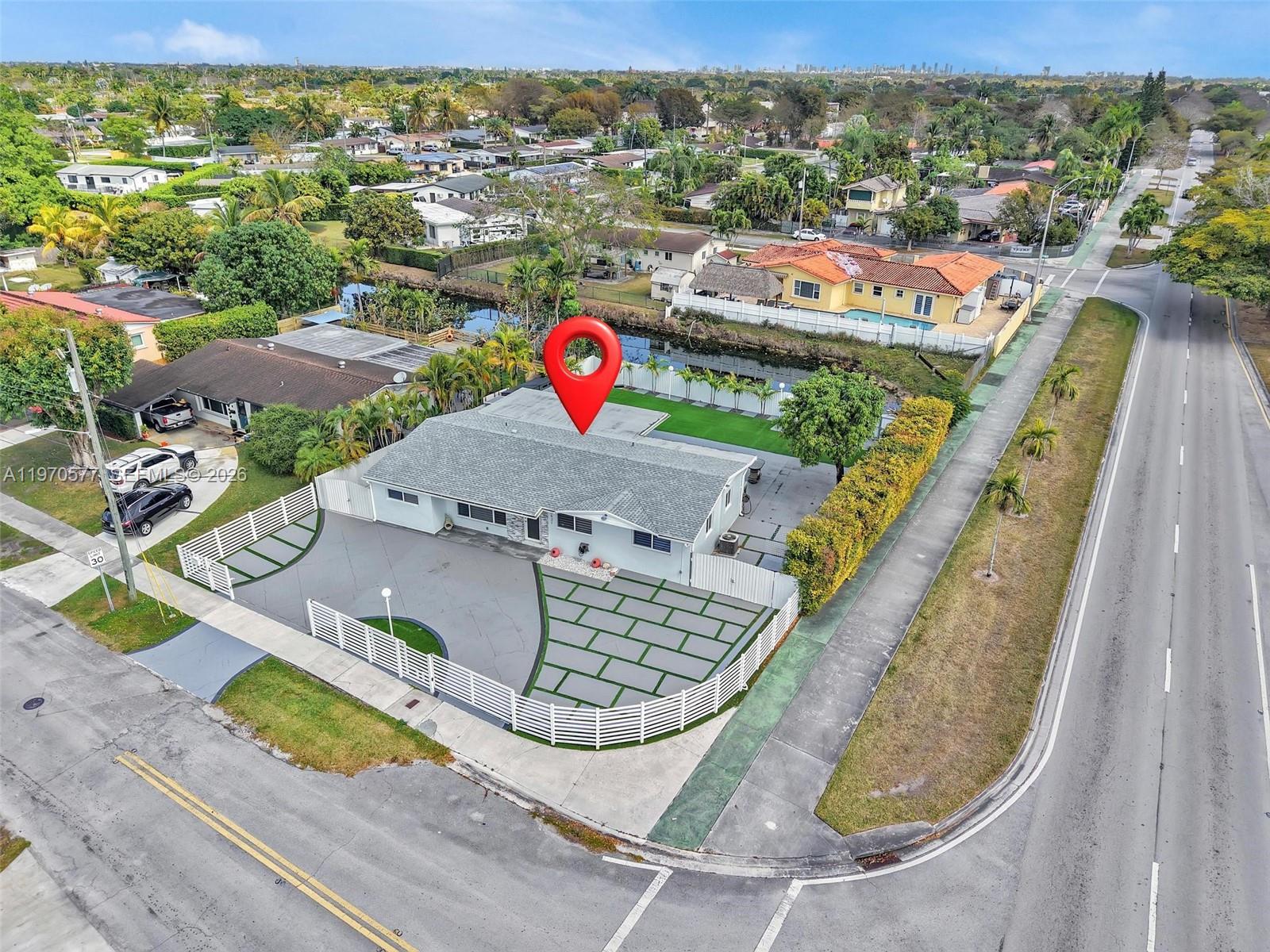 5521 Southwest 104th Avenue Miami, FL 33165 - Photo 1 of 28 swimming pool view with a seating space