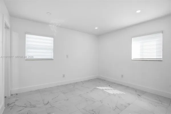 an empty room with a window