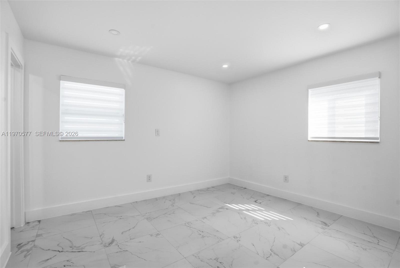 5521 Southwest 104th Avenue Miami, FL 33165 - Photo 14 of 28 an empty room with a window