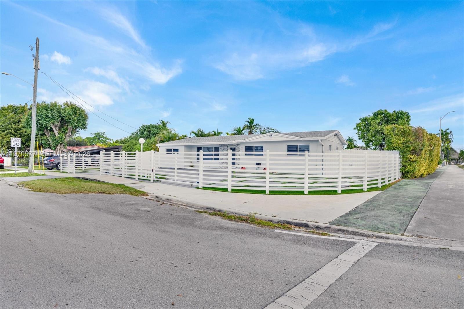 5521 Southwest 104th Avenue Miami, FL 33165 - Photo 2 of 28 a view of building with swimming pool and outdoor space