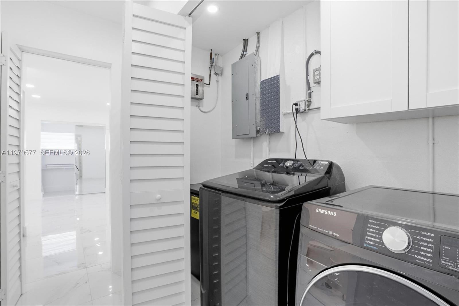 5521 Southwest 104th Avenue Miami, FL 33165 - Photo 22 of 28 a bathroom with a sink and a mirror