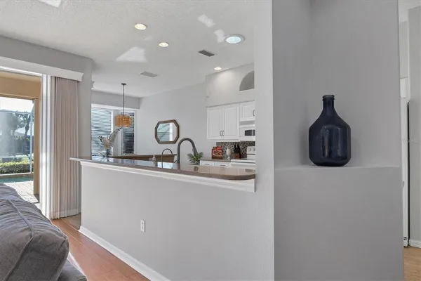 a close view of a sink and a washer and dryer