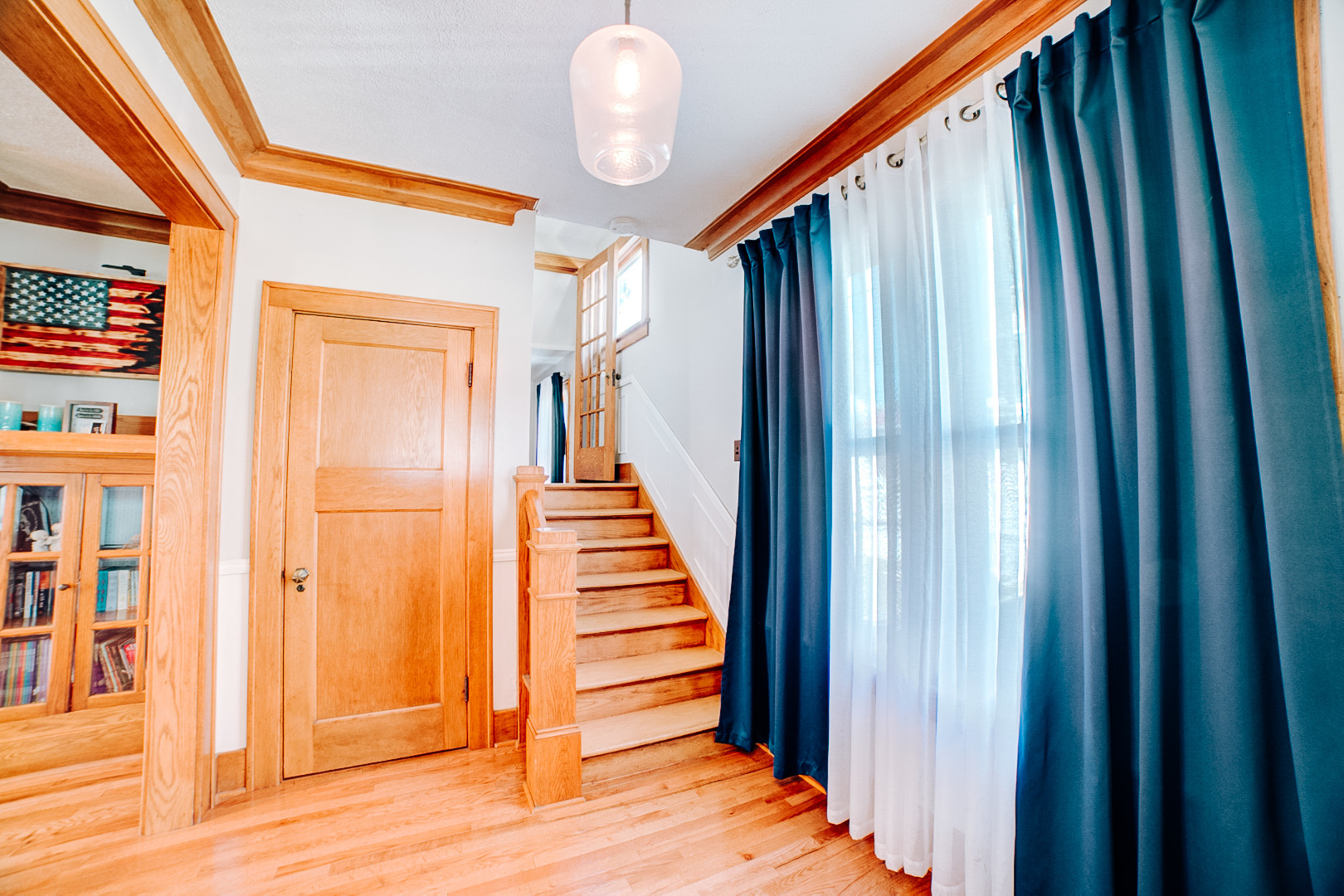 425 South 4th Street Watseka, IL 60970 - Photo 18 of 50 a view of a hallway with wooden floor and staircase