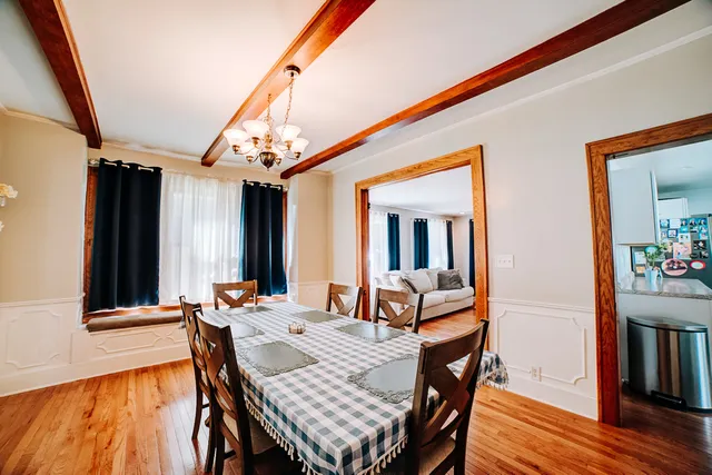 a view of a livingroom with furniture and wooden floor