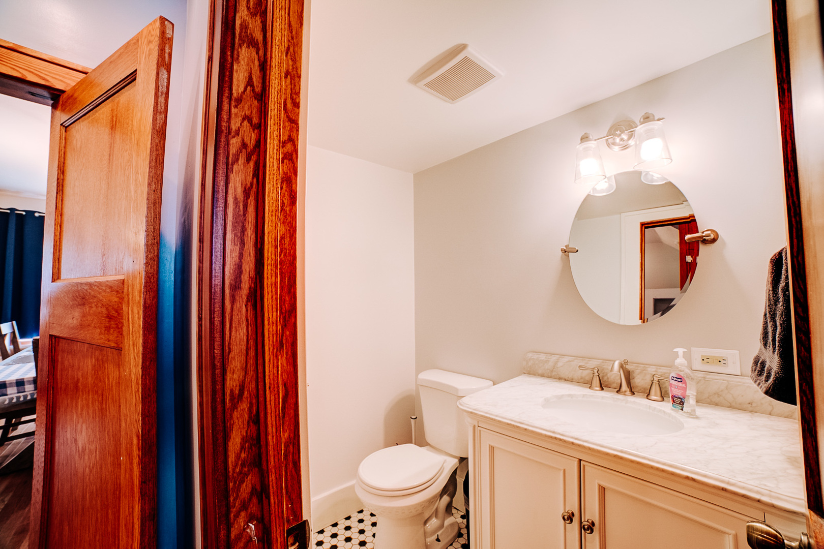 425 South 4th Street Watseka, IL 60970 - Photo 28 of 50 a bathroom with a sink vanity mirror and toilet