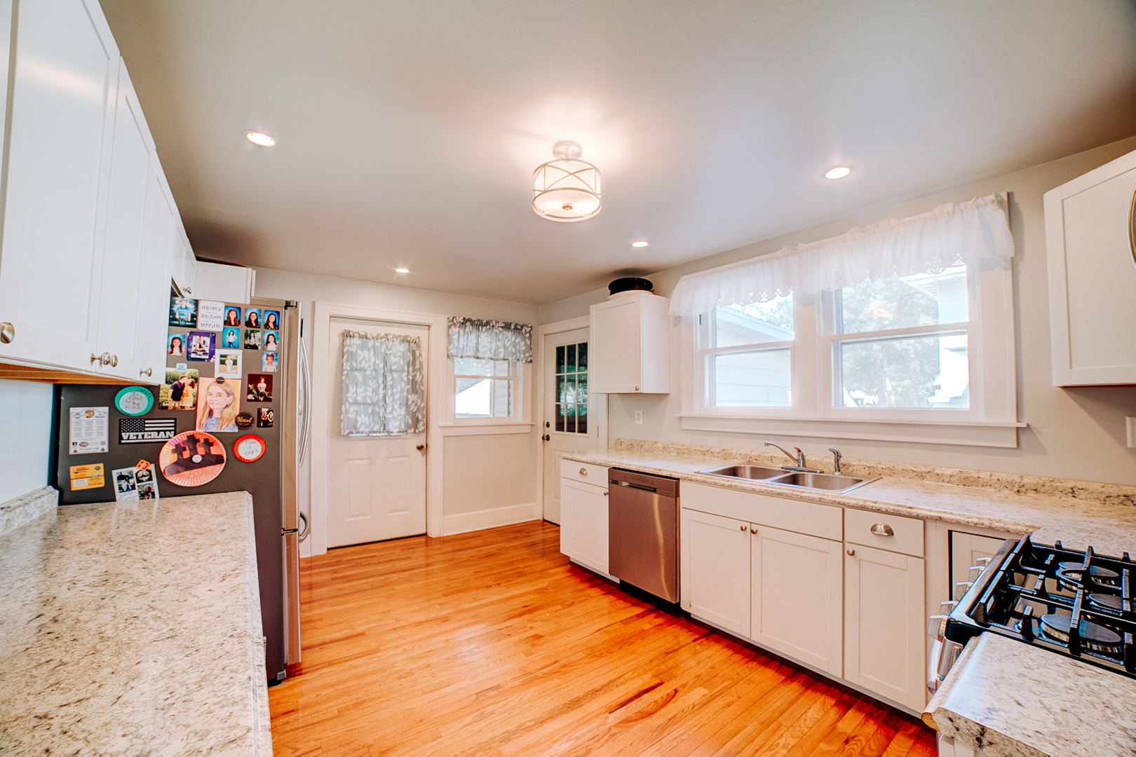 425 South 4th Street Watseka, IL 60970 - Photo 33 of 50 a view of a kitchen with cabinets and wooden floor