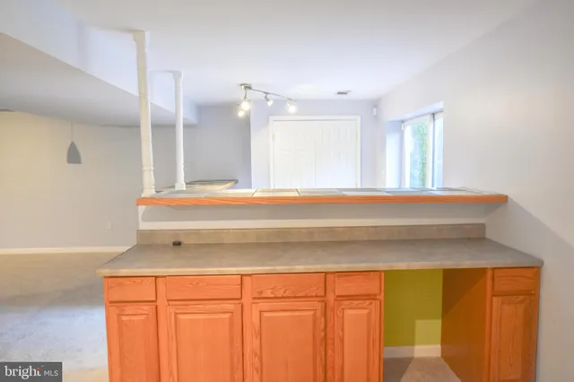 a bathroom with a tub and a sink
