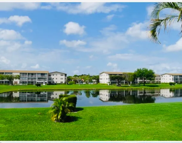 a front view of a building with garden