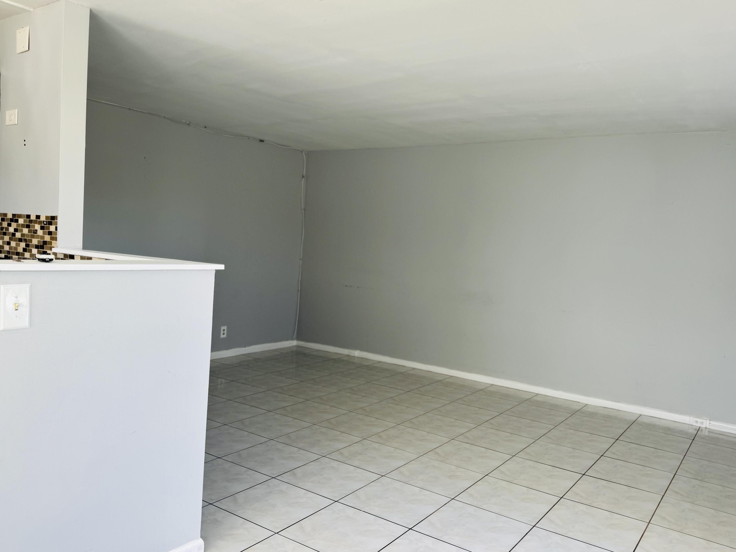 151 Brighton Drive, Unit D Boca Raton, FL 33434 - Photo 8 of 29 a view of room