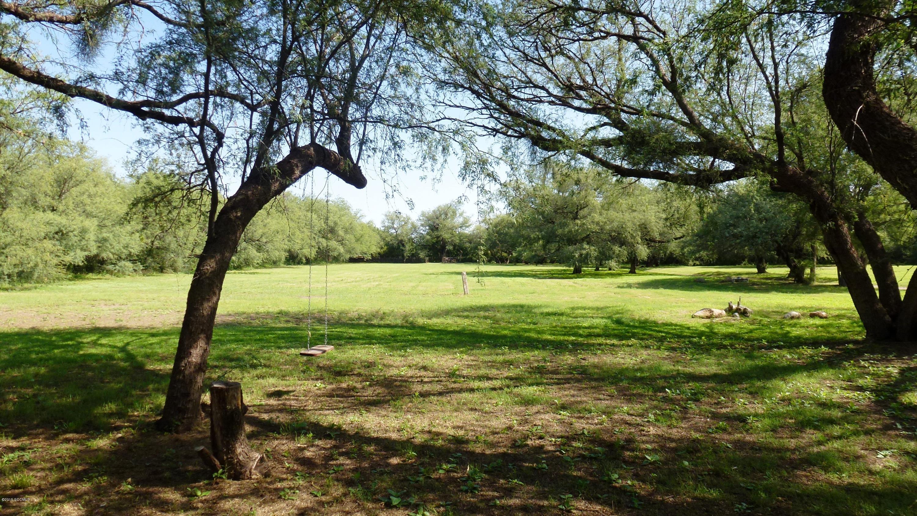 87 Clark Crossing Road Rio Rico, AZ 85648 - Photo 49 of 51 a view of outdoor space with trees all around