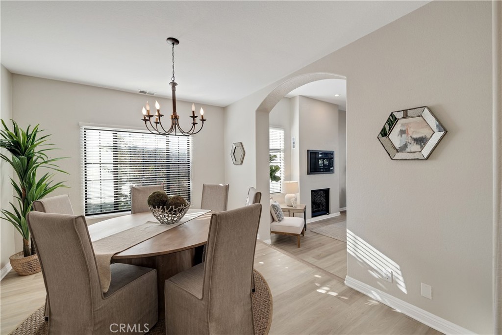 750 14th Street Manhattan Beach, CA 90266 - Photo 15 of 60 a view of a dining room with furniture window and wooden floor
