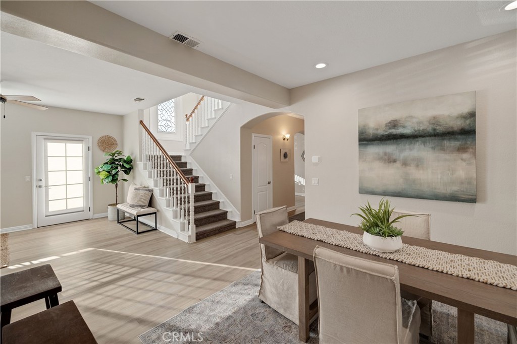 750 14th Street Manhattan Beach, CA 90266 - Photo 23 of 60 a living room with furniture and a potted plant