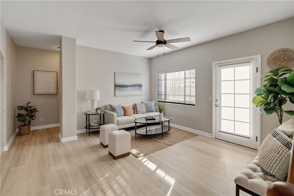 750 14th Street Manhattan Beach, CA 90266 - Photo 25 of 60 a living room with furniture and a large window