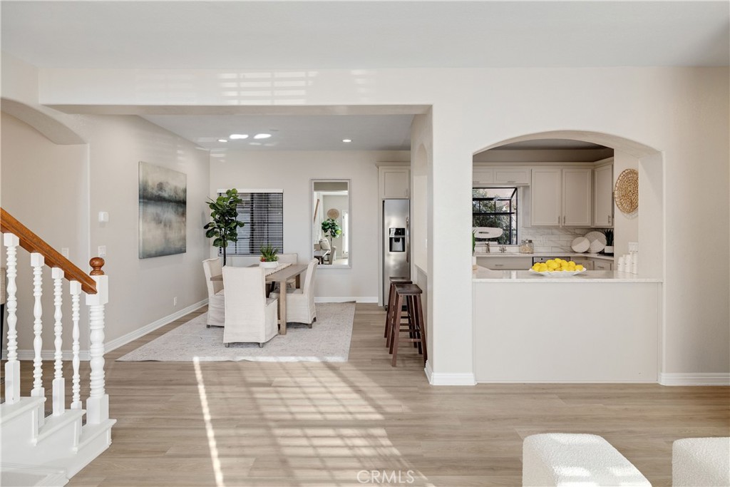 750 14th Street Manhattan Beach, CA 90266 - Photo 26 of 60 a living room with furniture and a wooden floor