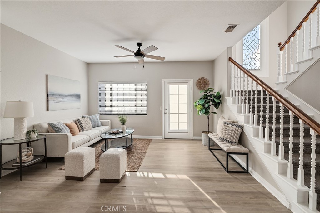 750 14th Street Manhattan Beach, CA 90266 - Photo 32 of 60 a living room with furniture and a window