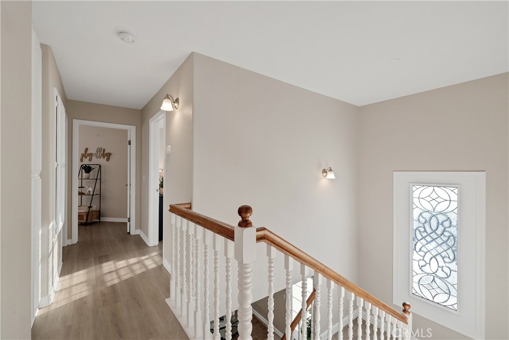 750 14th Street Manhattan Beach, CA 90266 - Photo 37 of 60 a view of a hallway with closet and stairs