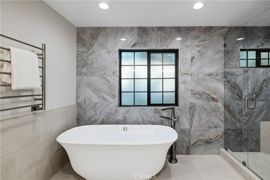 750 14th Street Manhattan Beach, CA 90266 - Photo 47 of 60 a white bath tub sitting in a bathroom