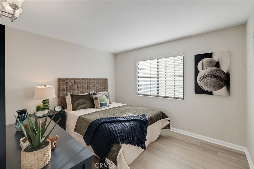 750 14th Street Manhattan Beach, CA 90266 - Photo 49 of 60 a bedroom with a bed and window