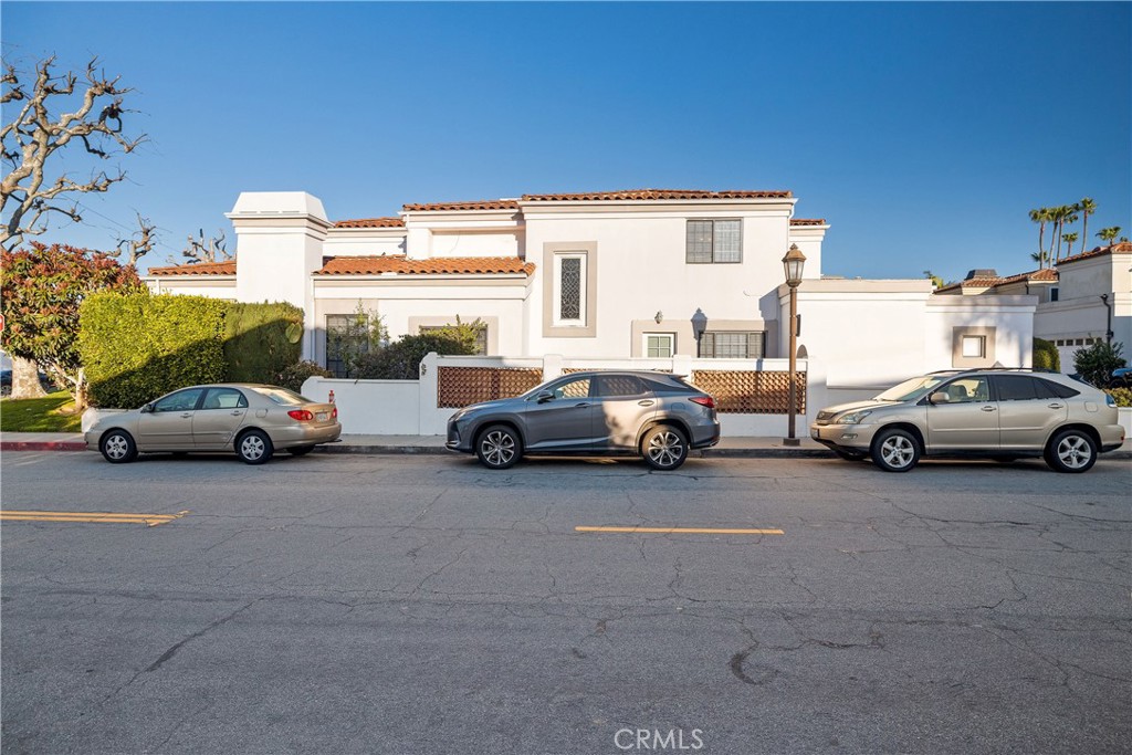 750 14th Street Manhattan Beach, CA 90266 - Photo 56 of 60 a view of cars parked in front of a house