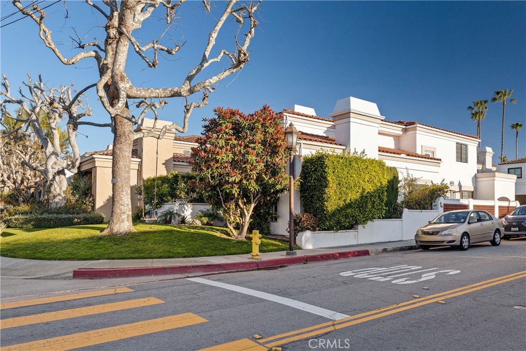 750 14th Street Manhattan Beach, CA 90266 - Photo 57 of 60 a view of a city street lined with tall buildings