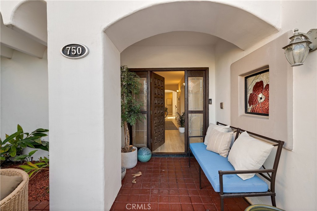 750 14th Street Manhattan Beach, CA 90266 - Photo 7 of 60 a view of a hallway with furniture and front door