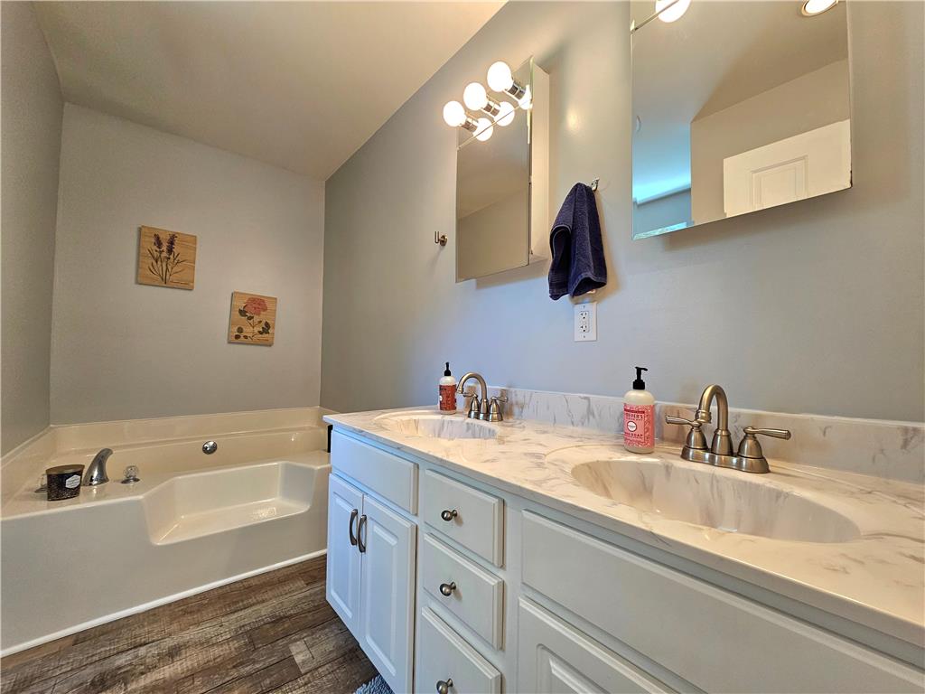 190 Canal Road Easton, PA 18042 - Photo 15 of 39 a bathroom with a tub double sink and mirror