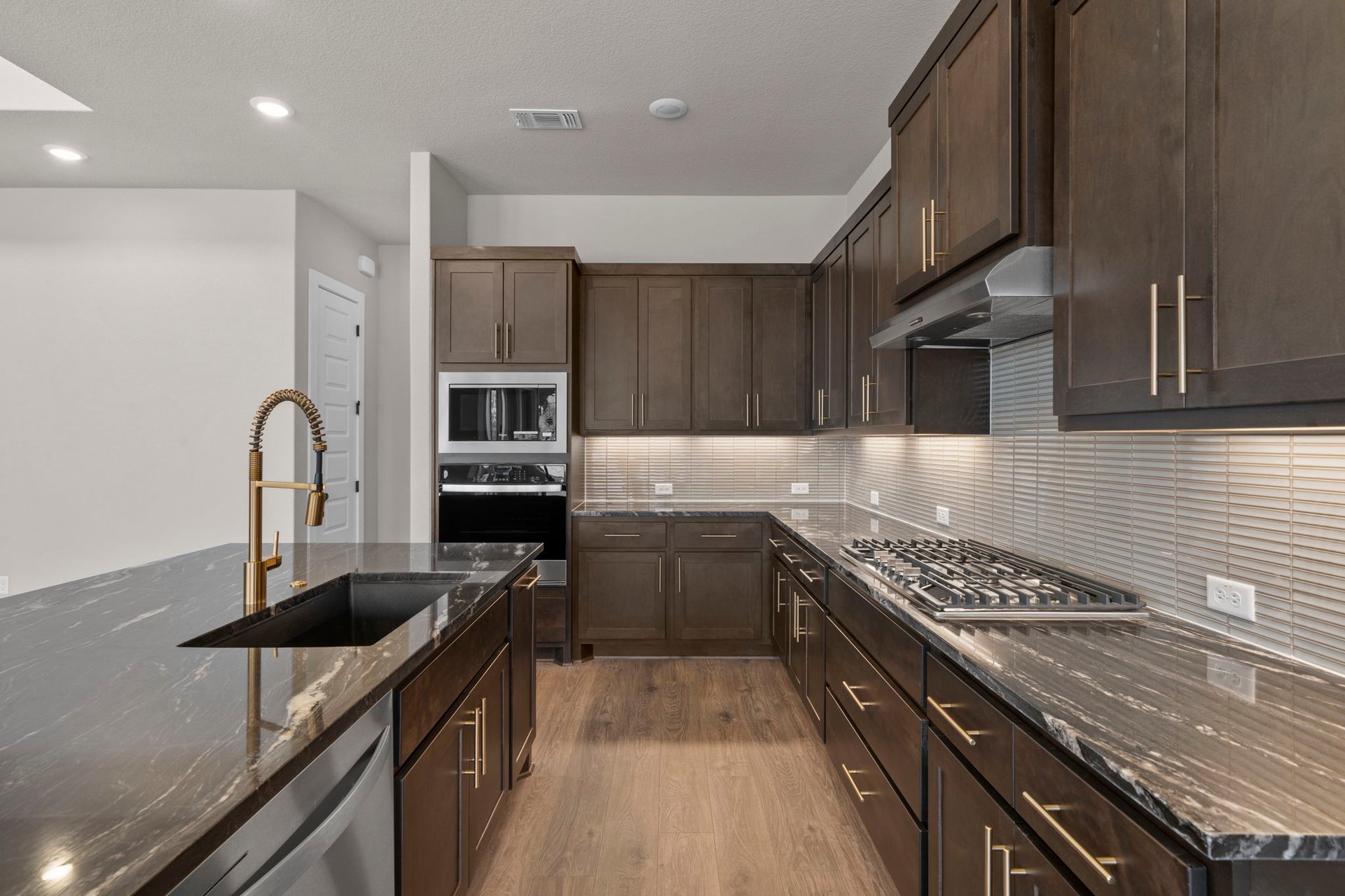 812 South Hemingway Loop Liberty Hill, TX 78642 - Photo 11 of 39 Stunning finishes in Light & Bright Kitchen