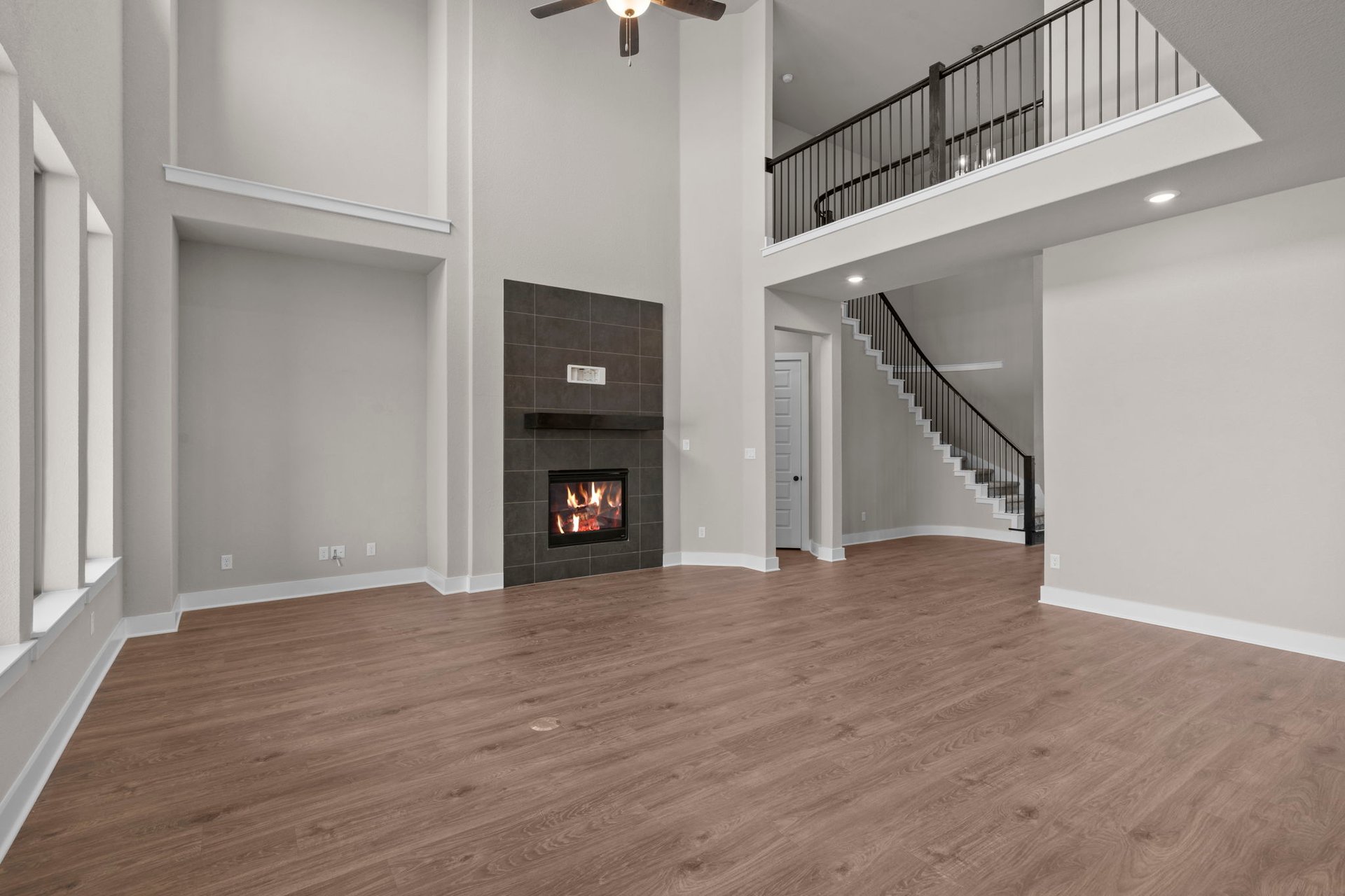 812 South Hemingway Loop Liberty Hill, TX 78642 - Photo 15 of 39 Family Room with soaring ceiling & fireplace
