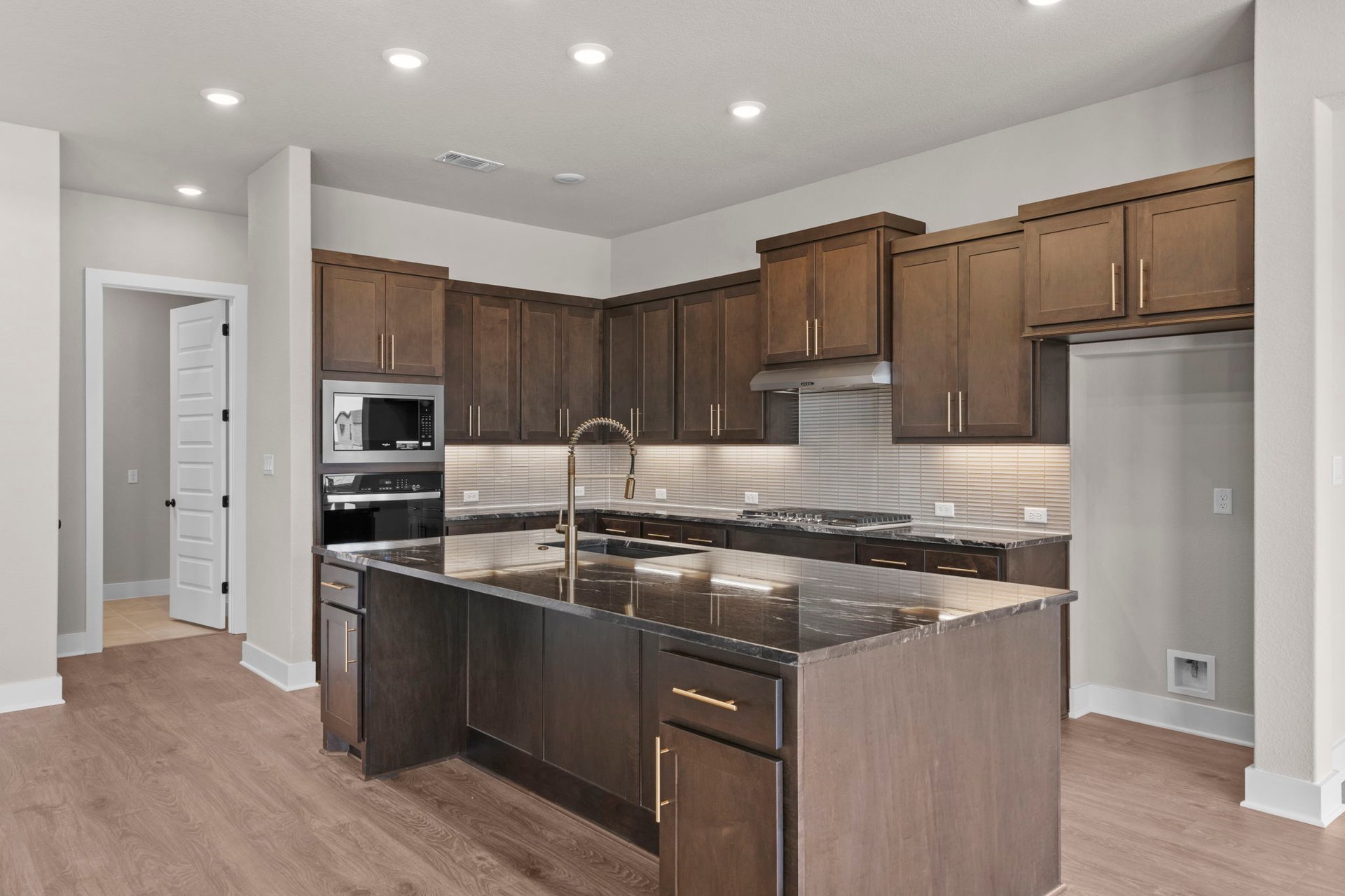 812 South Hemingway Loop Liberty Hill, TX 78642 - Photo 10 of 39 Open Concept Kitchen