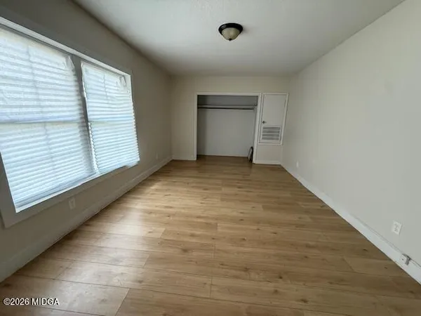 a view of an empty room and window