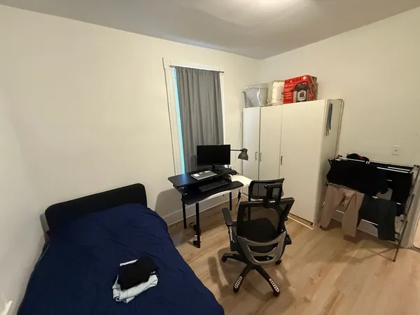 a view of workspace with lounge chair