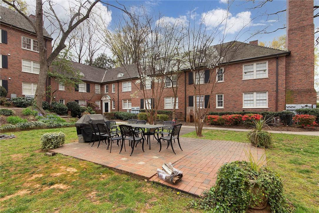 104 Colville Road, Unit 41A Charlotte, NC 28207 - Photo 19 of 21 a view of a house with backyard and sitting area